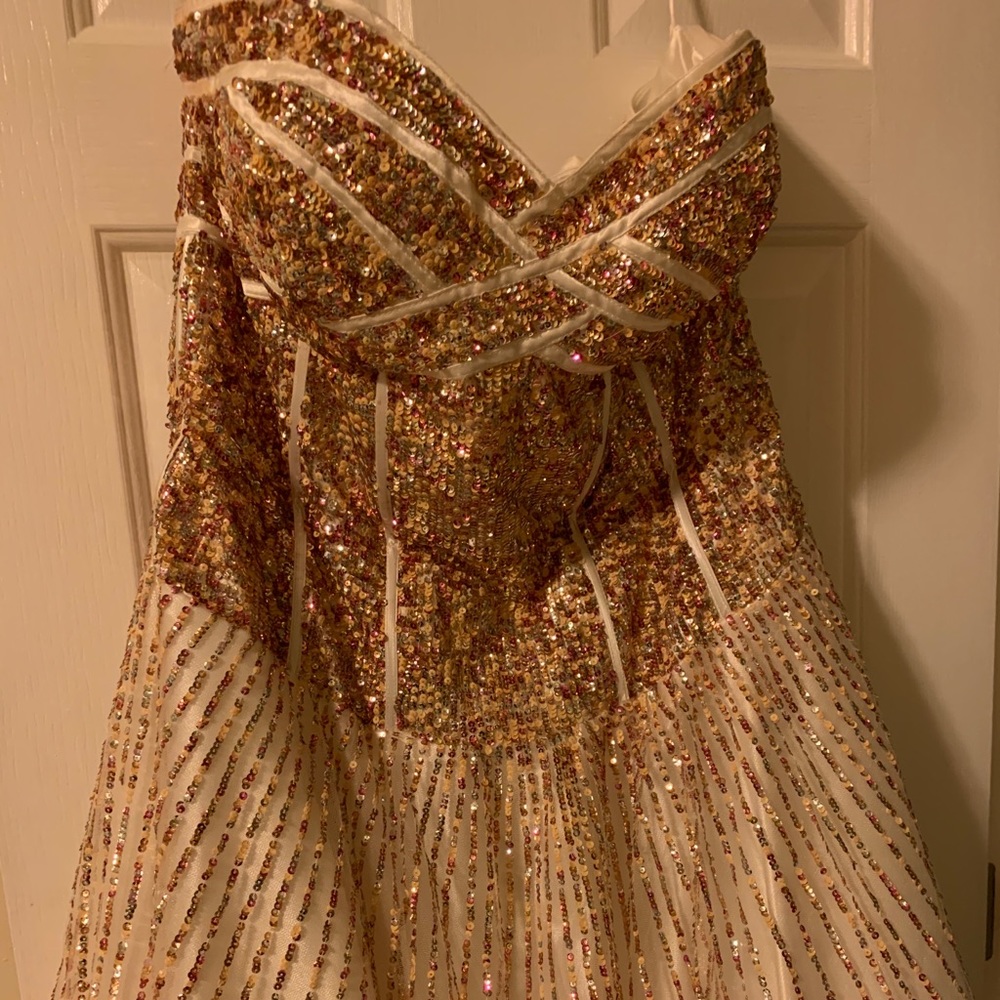 White, Gold, and Maroon Strapless Prom Dress